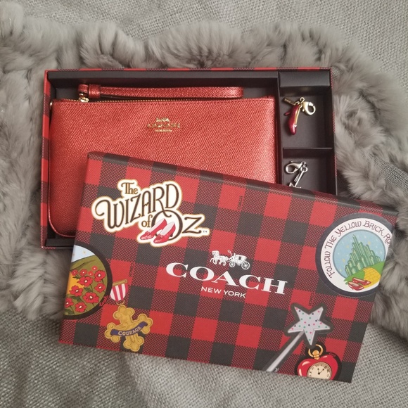 coach wizard of oz wristlet
